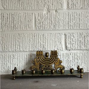 Vintage Dayagi Menorah.  8 3/4”L x 2 3/4” H x 2”D.